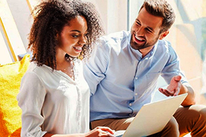 photo of man and woman at work