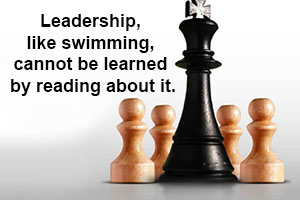Image comparing leadership to swimming